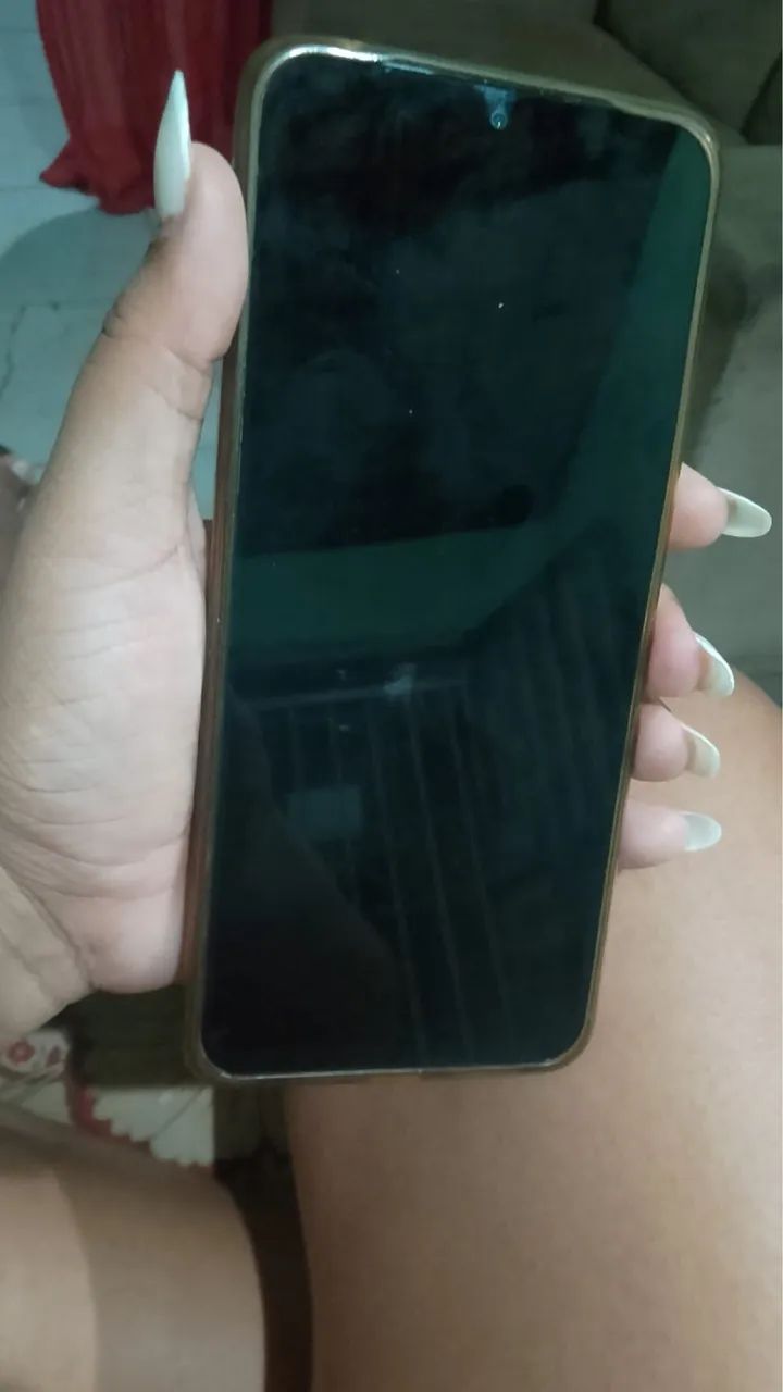 Vendo celular redimi 14c novo na caixa sem marcas de uso contato * 