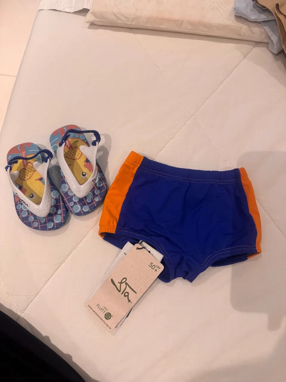 Sunga e chinelo 1 ano sem uso - Foto 2