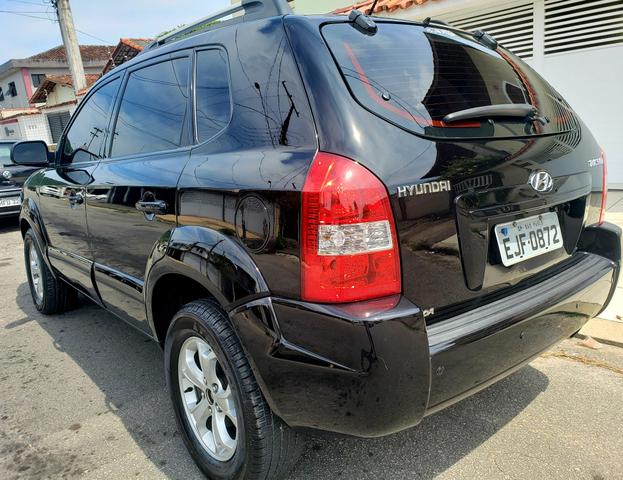 Tucson 2.0 automática banco café completa financio sem entrada menor preço da olx - Foto 4