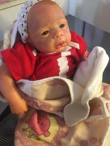 BEBÊ REBORN REALISTA CABELINHO FIO A FIO BELINHA TODA EM SILICONE