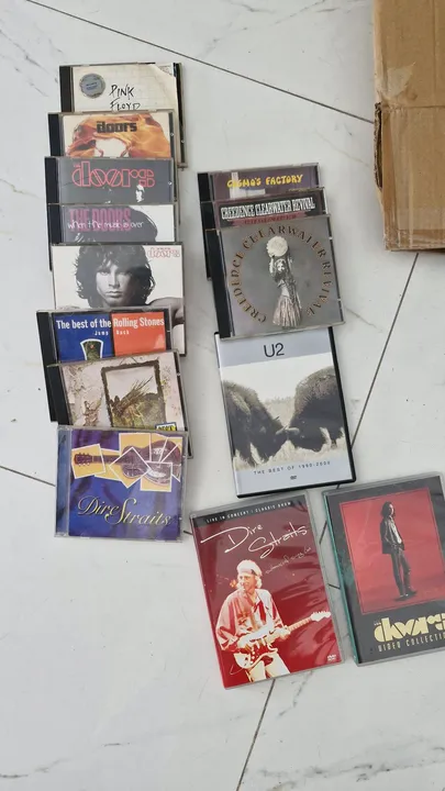 Coleção de cds e DVDs rock internacional
