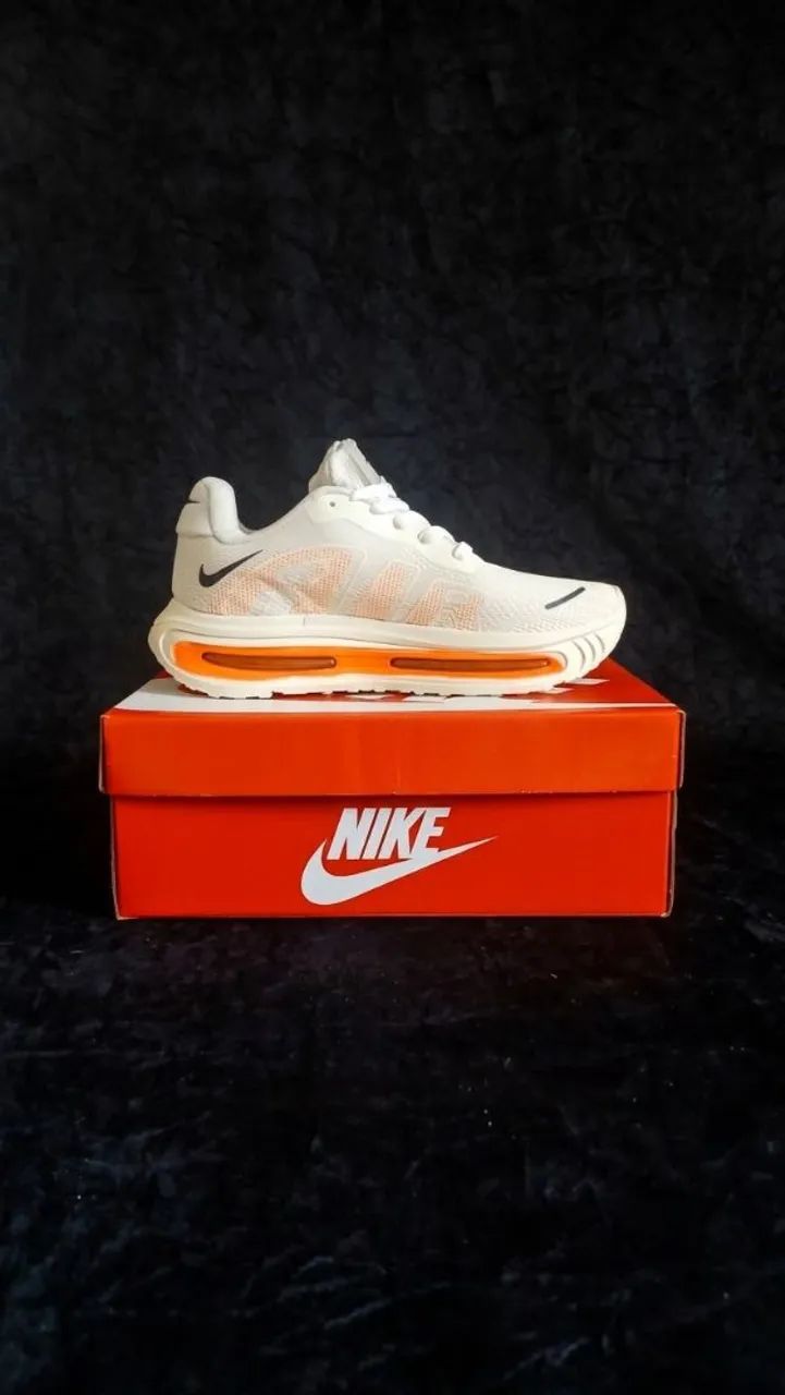 Tênis Nike Vomero Unisex - Branco e Laranja