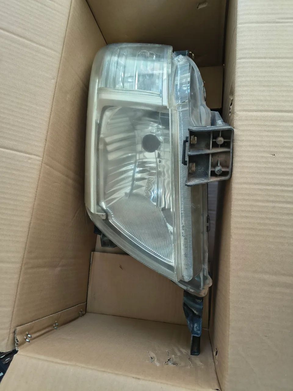 lanterna frontal Hilux  SRV / CD2012  LD e LE  - Foto 3