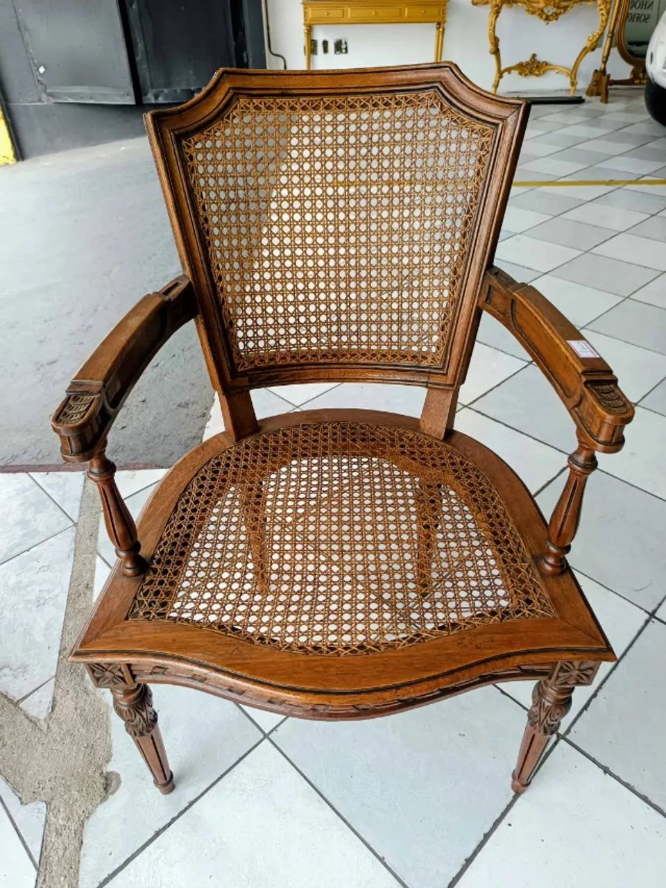Louis XV-style chair made of noble wood with a straw seat