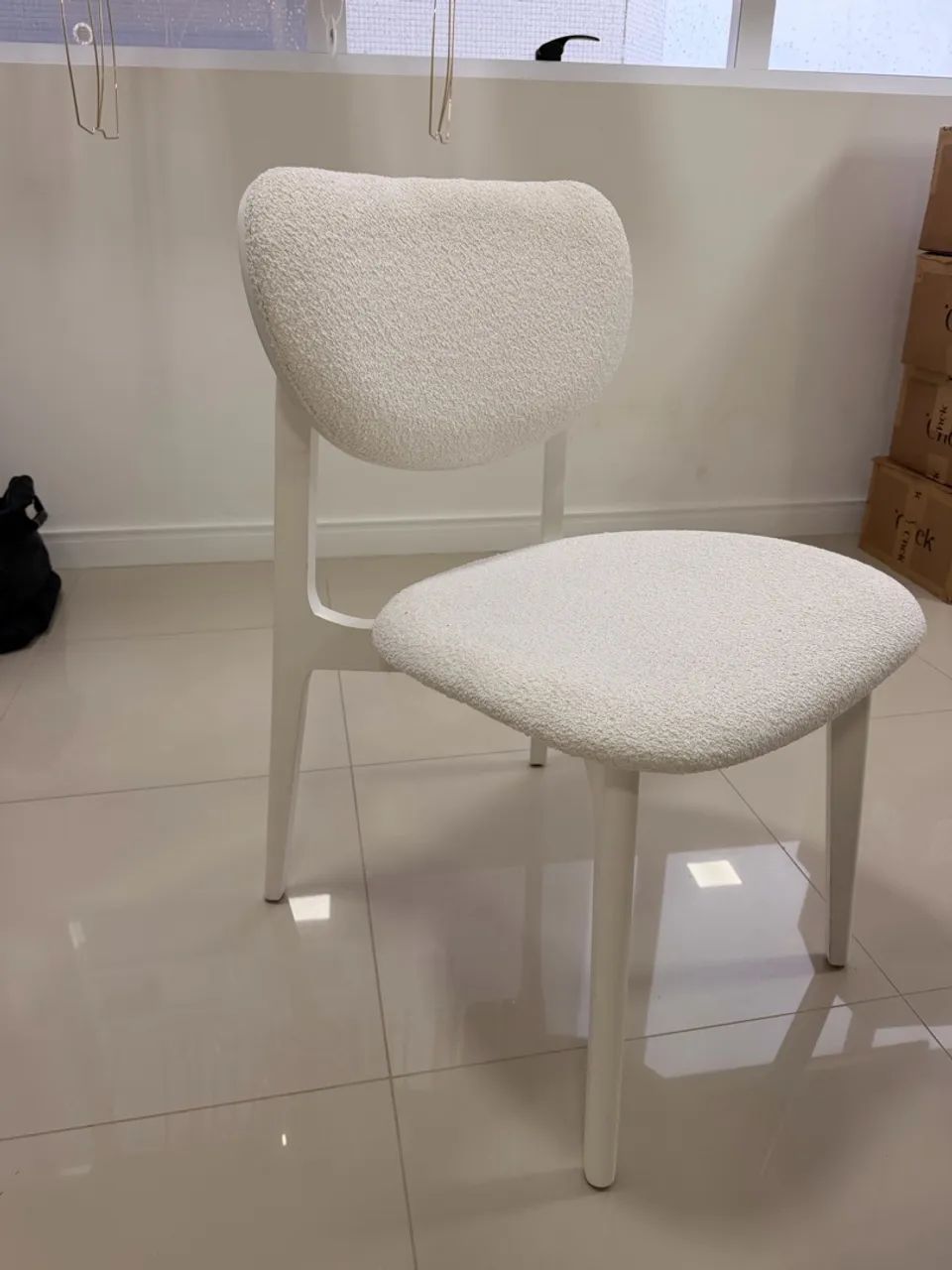 Cadeiras em bouclé
