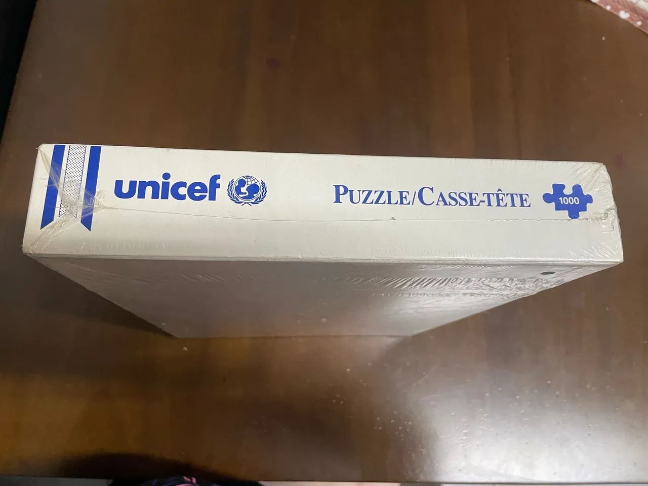 Quebra-cabeça UNICEF 1000 peças ( Lacrado) - Foto 2