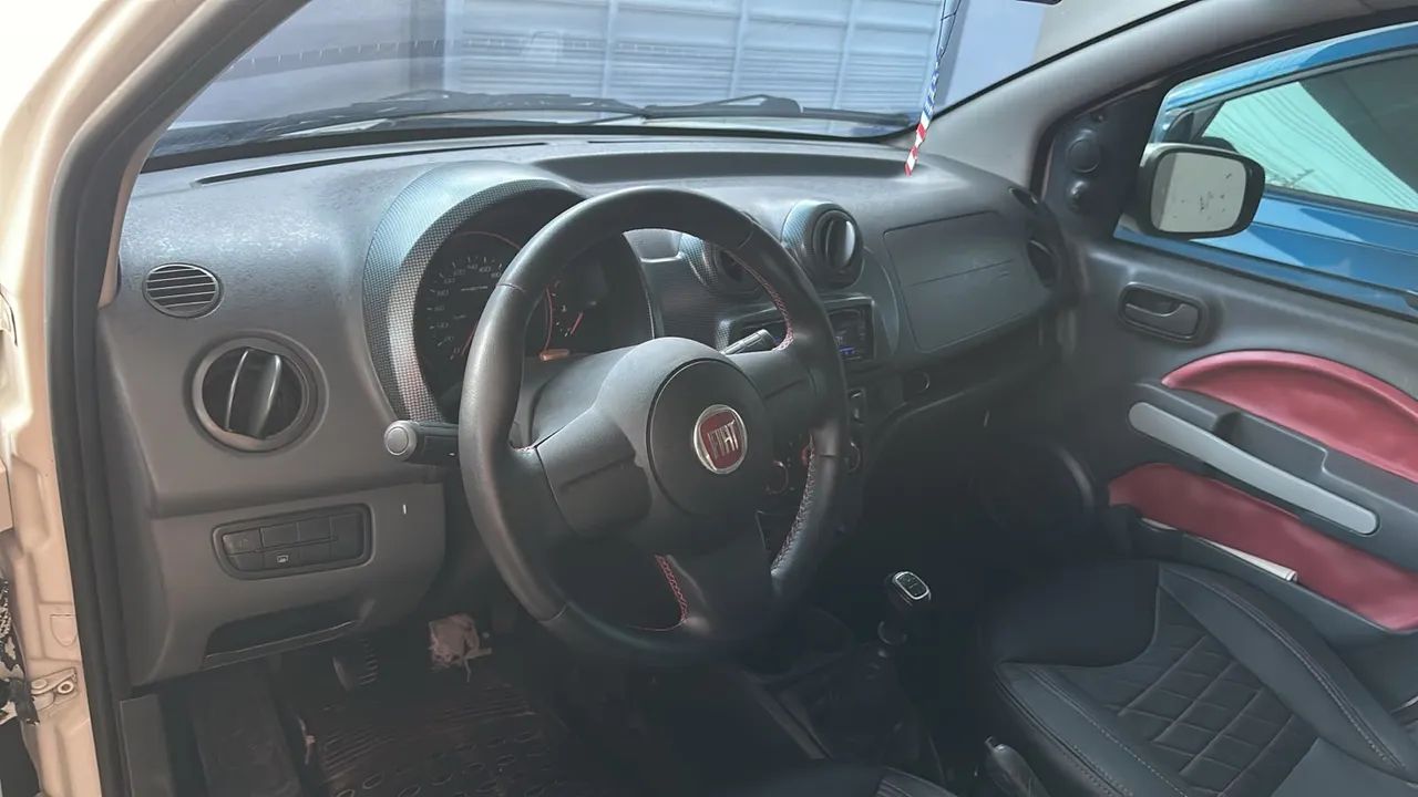 Fiat Uno Sporting 1.4 EVO Fire Flex 8V 4P 2013 - Foto 4