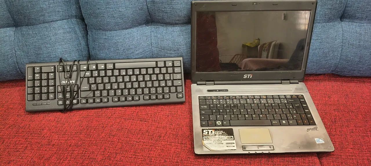 Notebook STI usado (para peças) - Foto 2
