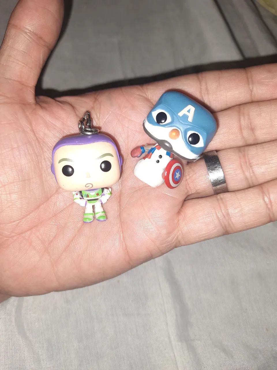 2 Funko pocket pop do Buzz lightyear e Cap Snowman  - Foto 5