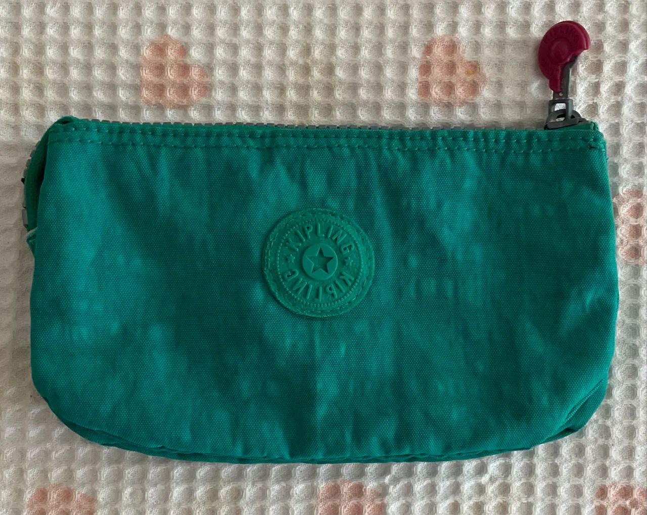 Bolsinha verde Kipling 