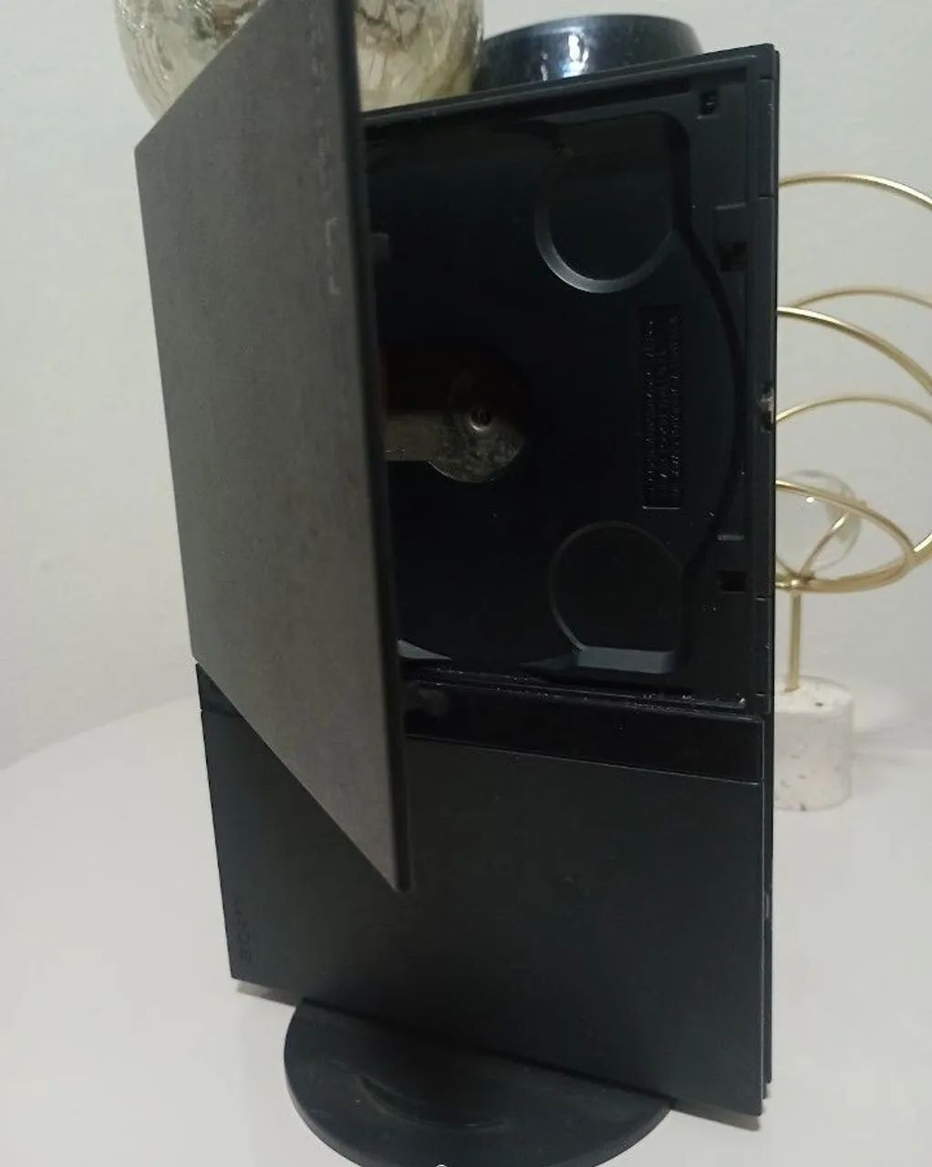 PS2 slim só tem a placa com defeito não sei qual defeito 