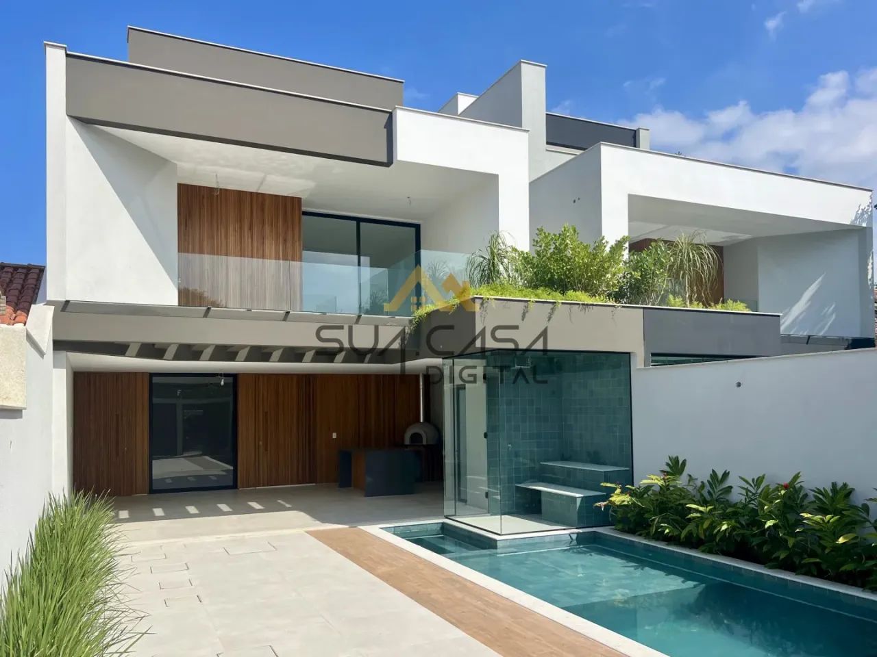 Maravilhosa Casa Triplex contemporanea no Condominio Rio Mar na Barra da Tijuca REF: CA026