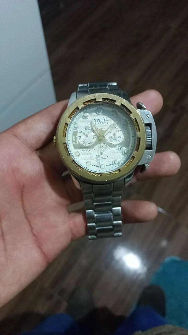 VENDO OU TROCO INVICTA 
