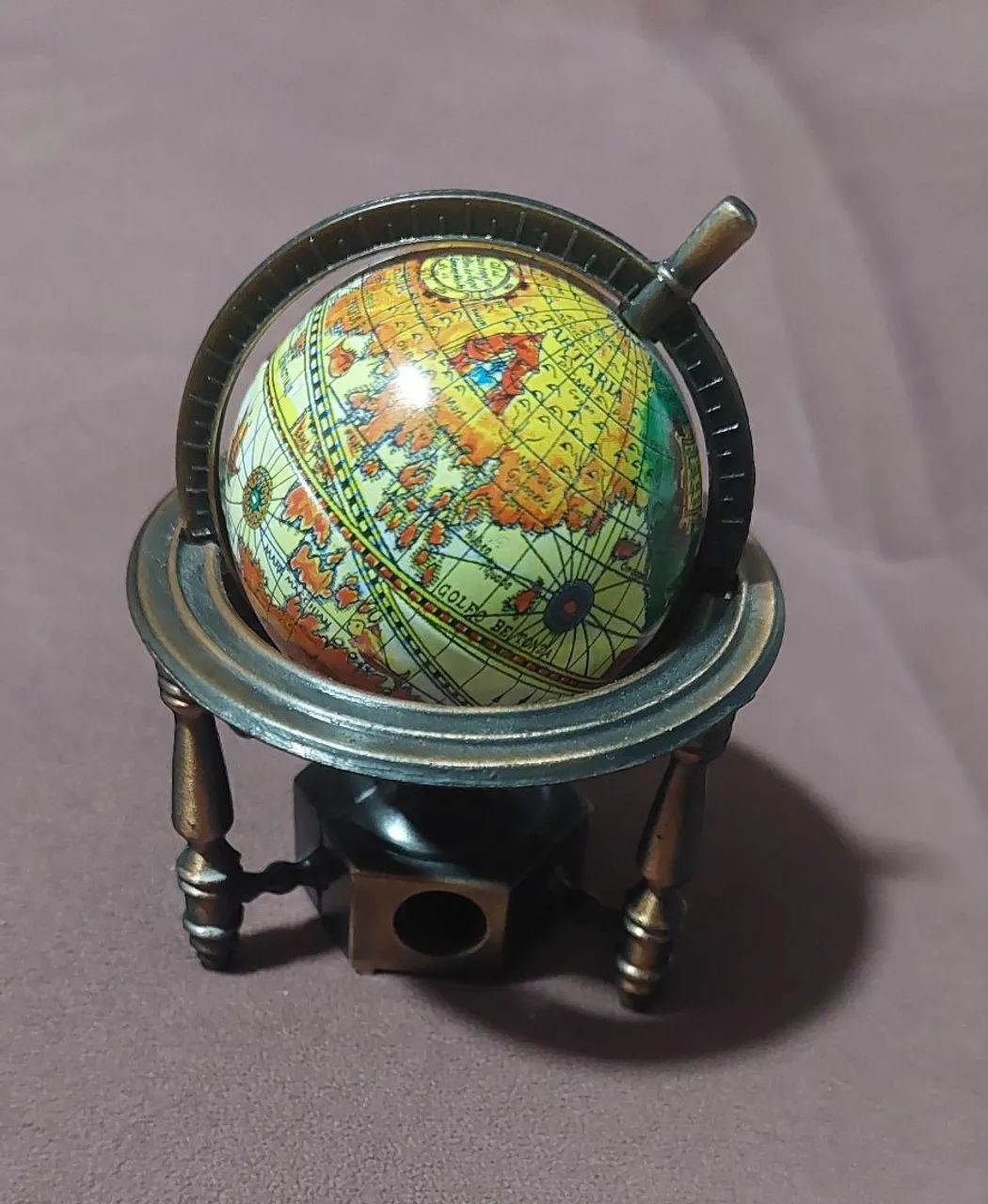 Apontador globo colecionador