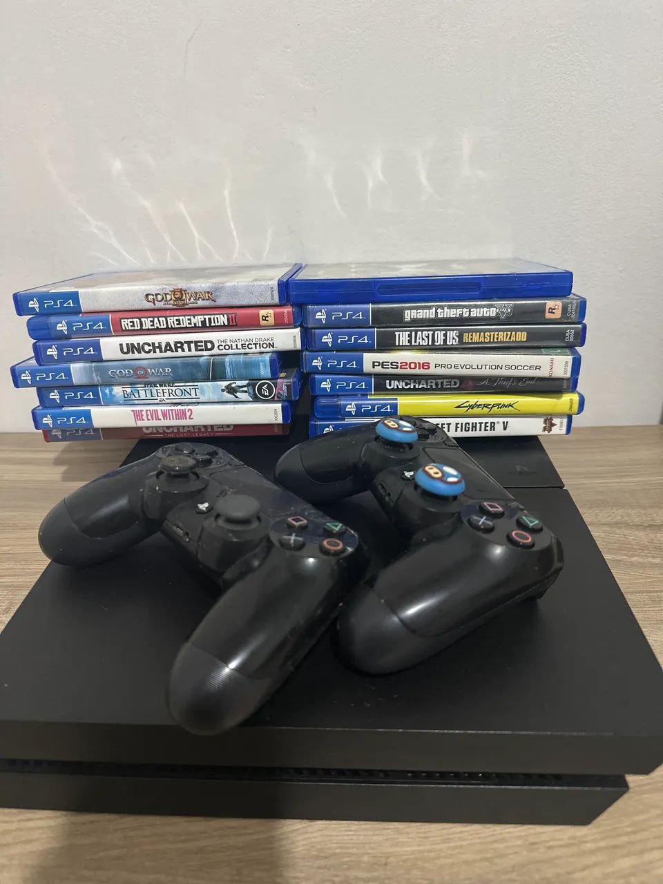 PS4 + 14 Jogos64294630692097120