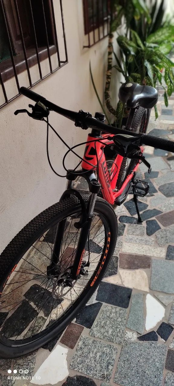 BIKE CAIRU LOTUS ARO 29, 21 MARCHAS, FREIO A DISCO, QUADRO 17.5, LARANJA/PRETO (COM NOTA) - Foto 4