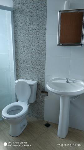Kitnets com cômodo amplo para dois ambientes (sala e quarto), cozinha com gabinete - Foto 10