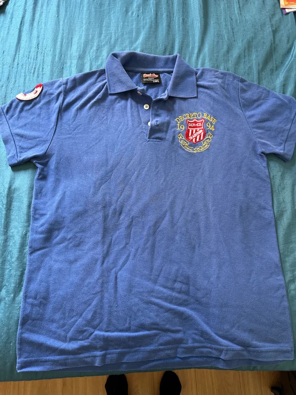 Camiseta polo TAM GR azul Decreto base 