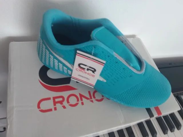 chuteira society masculina 