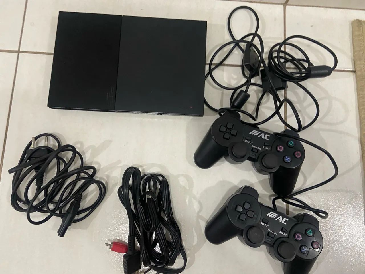 Complete PlayStation 2 with 2 Controllers64290073517827121