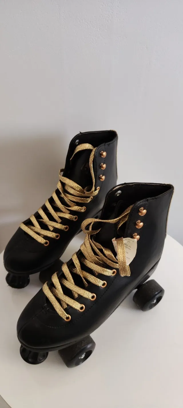 Patins oxer quad preto e dourado