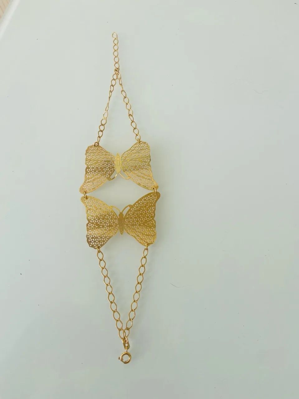 Pulseira dourada borboletas ajustável