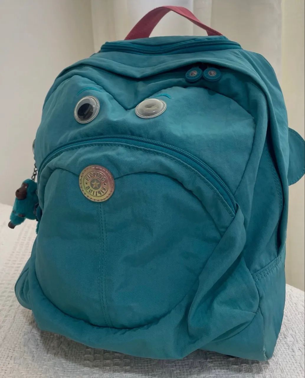 Mochila escolar com rodinhas Kipling original azul Tiffany  - Foto 4