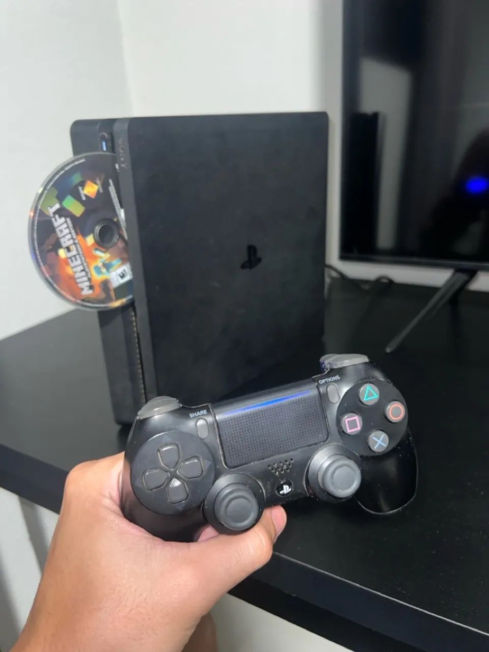 PS4 Slim - 500Gb with 1 controller and games64318475078659124