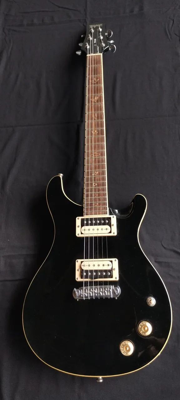 Guitarra Tagima PR200 - Pra sair logo