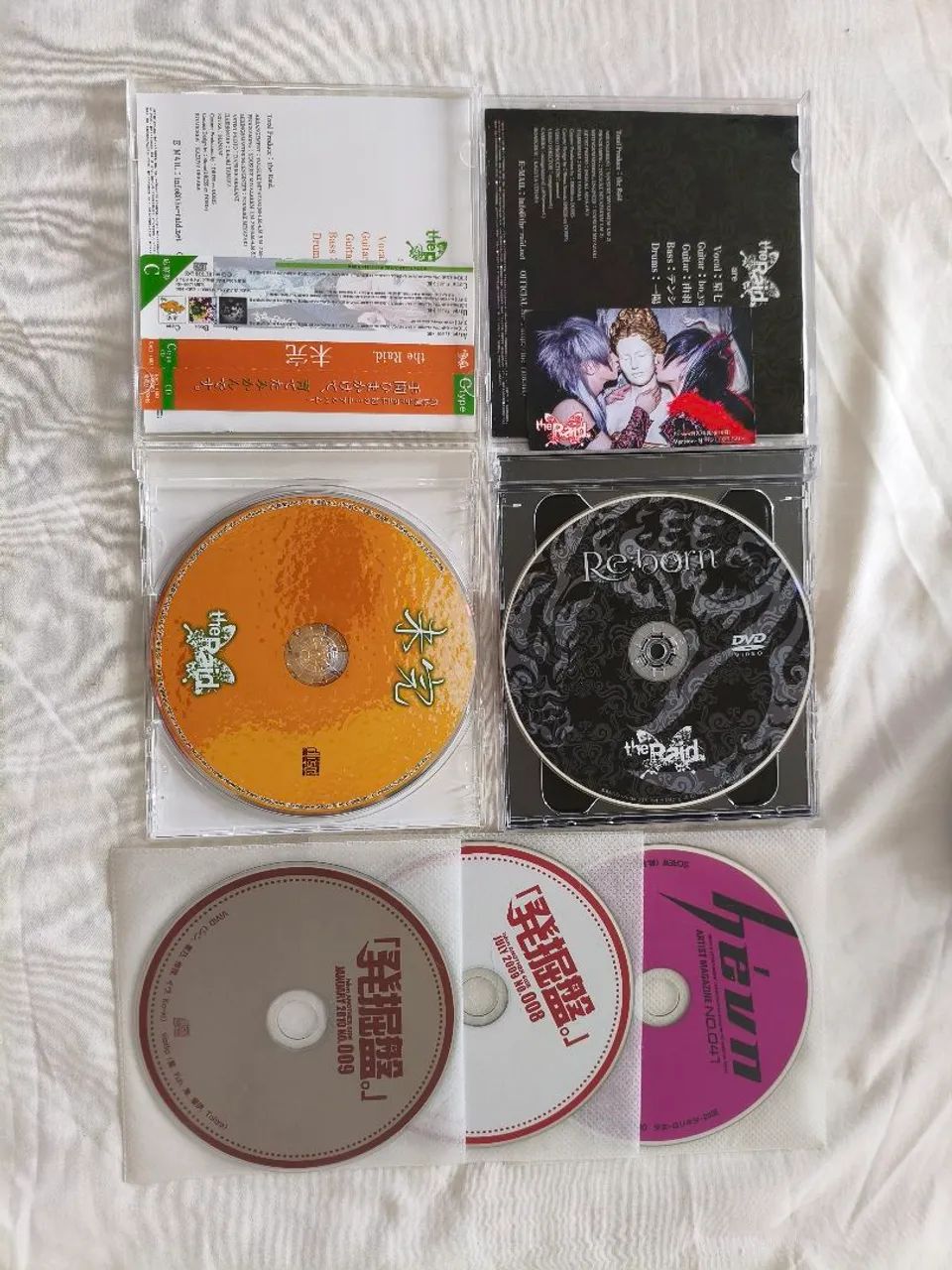 LOTE CDS VISUAL KEI EDIÇÕES LIMITADAS THE RAID E REVISTA HEVN