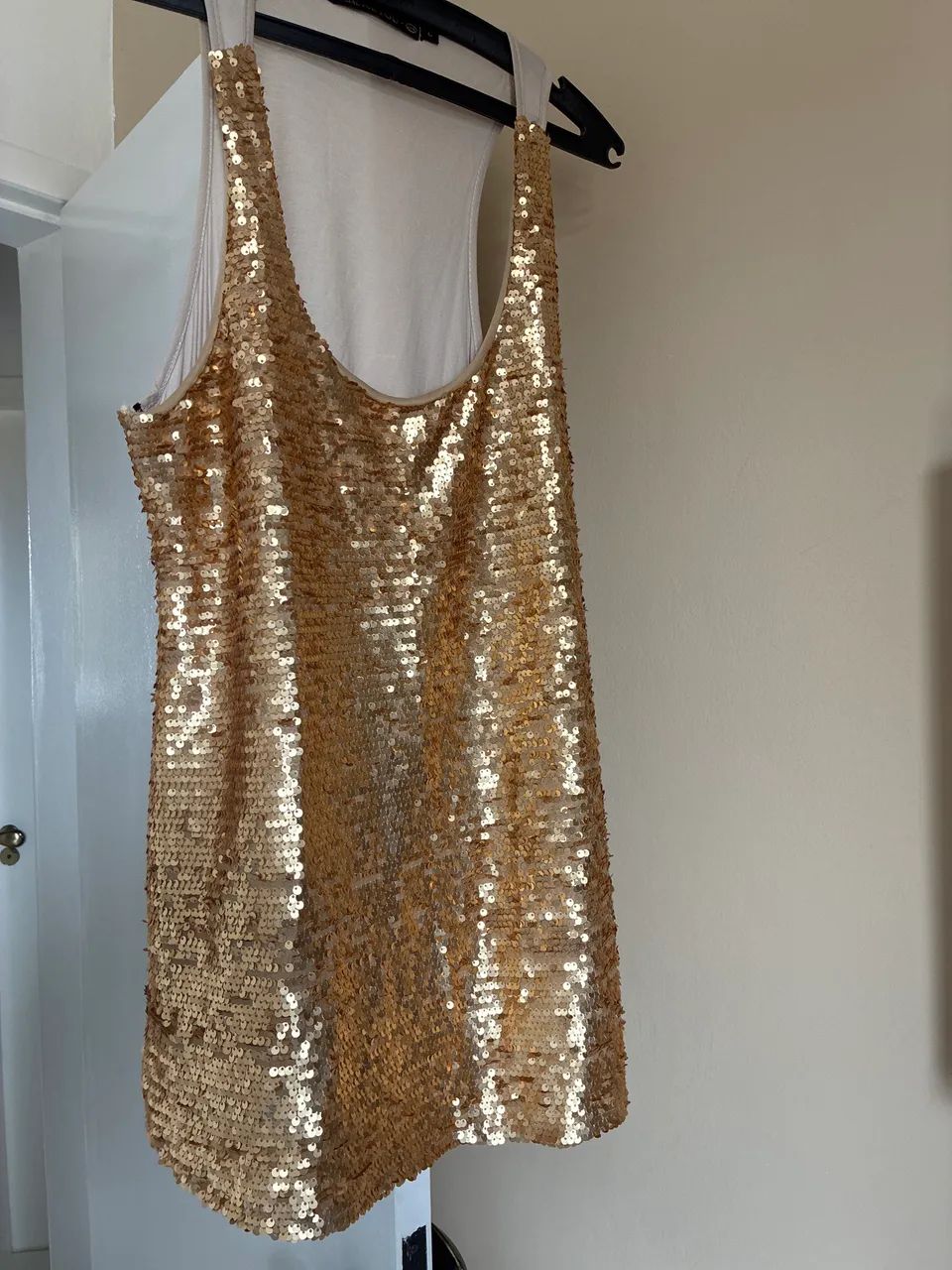 Blusa dourada paitê