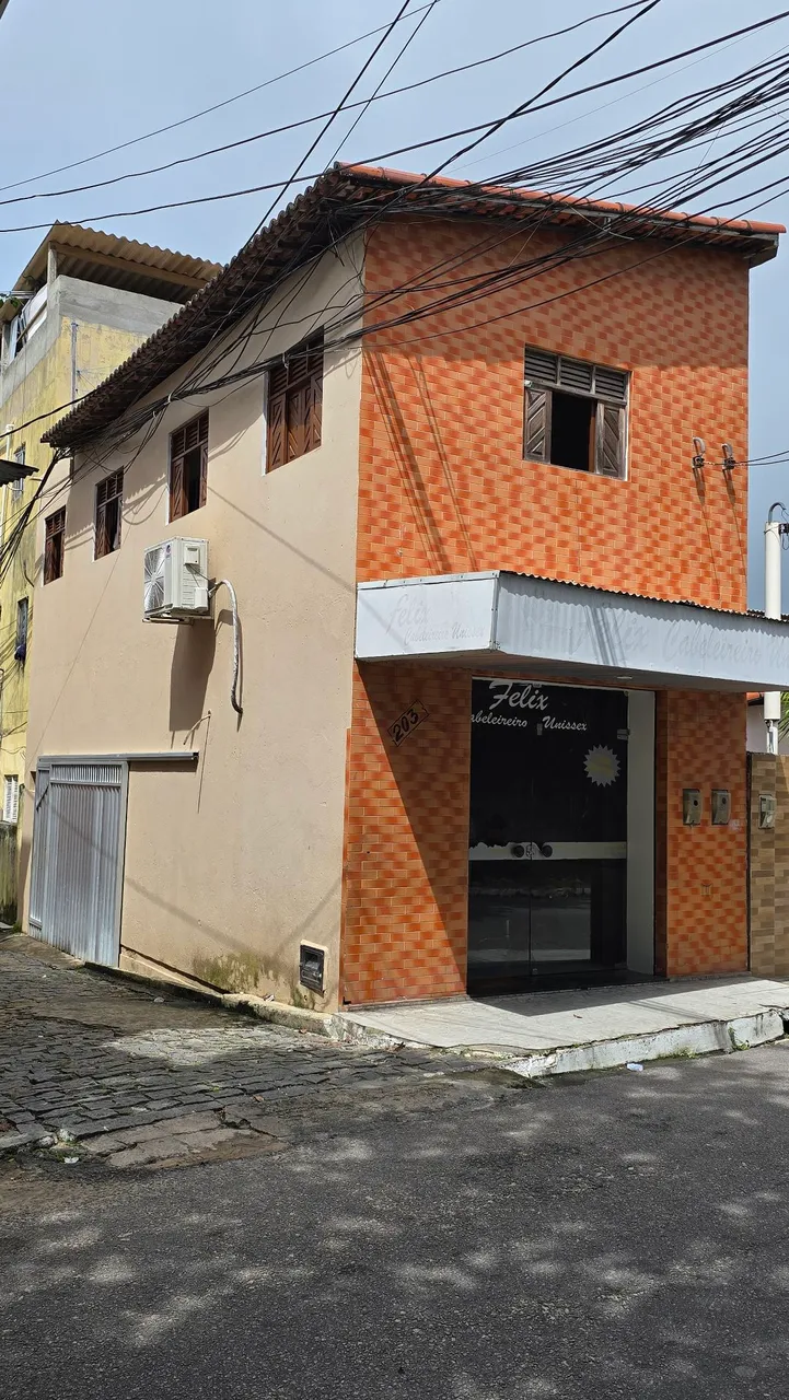 Casa primeiro andar com ponto comercial