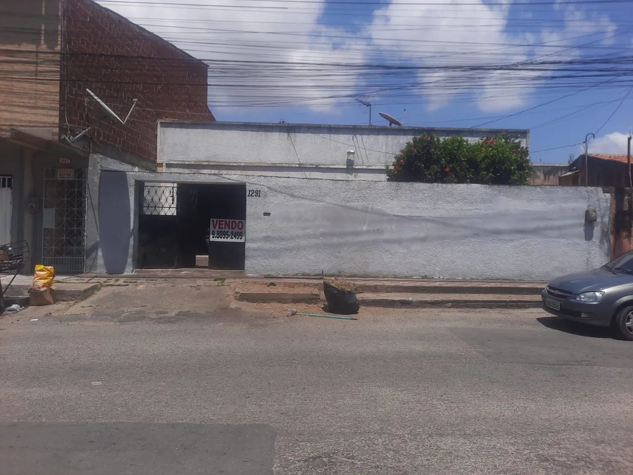Vendo terreno com casa construída 