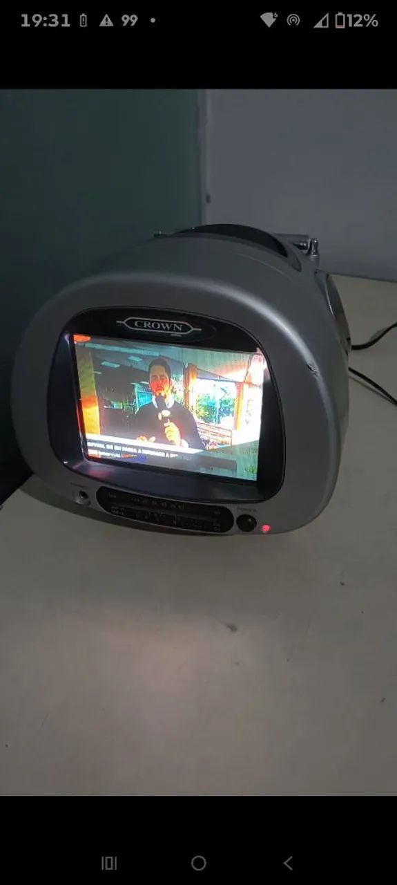 Mini tv com  rádio AM e FM 