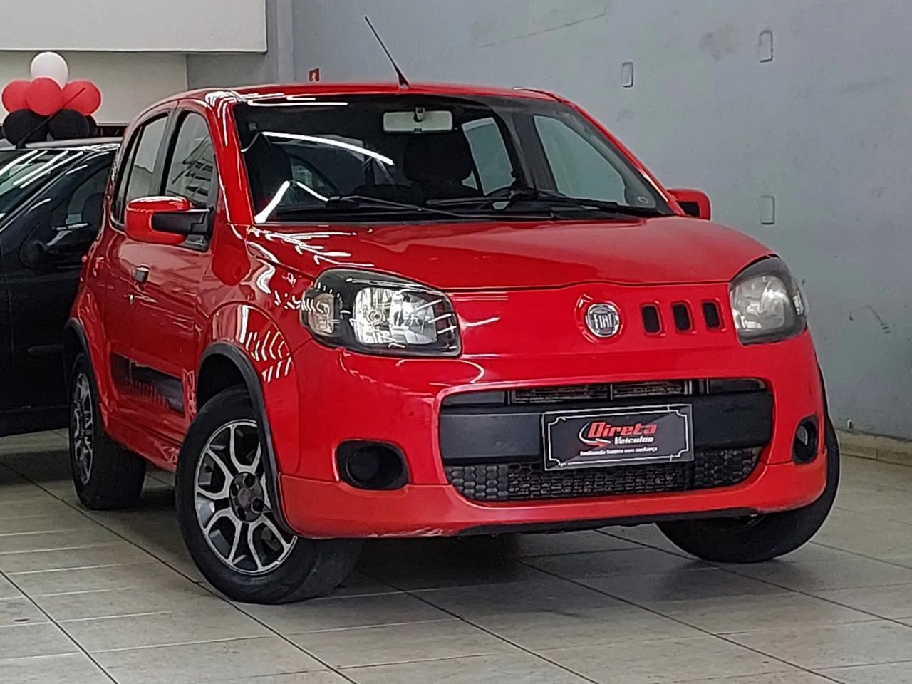 Fiat Uno Sporting 1.4 EVO Fire Flex 8V 4P 2013 - Foto 3
