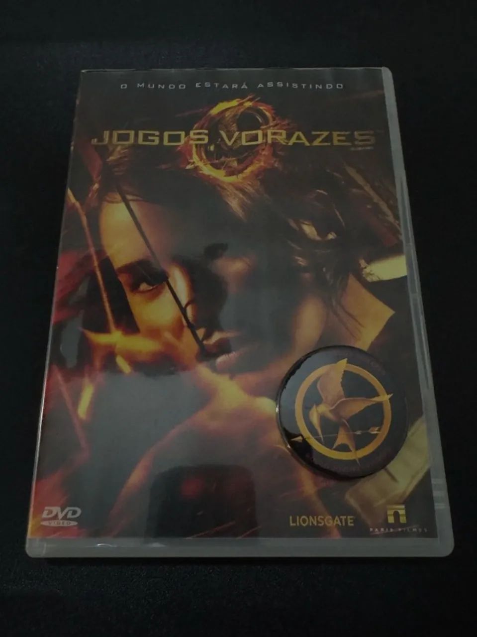 DVD JOGOS VORAZES ORIGINAL ACOMPANHA BROCHE DE PLÁSTICO DO FILME - Foto 2