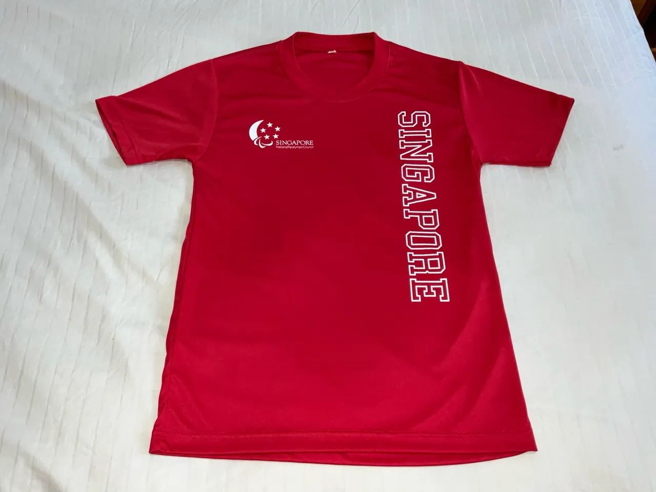 Camisa oficial do Comitê Paralímpico de Singapura
