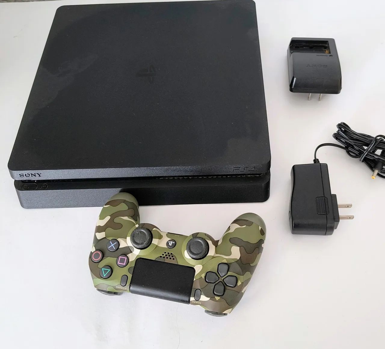 PLAYSTATION 4 + 3 CONTROLLERS + CHARGING STATION64717108101891120