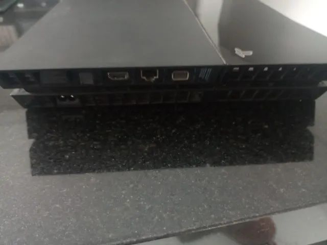 PS 4 usado com 8jogos de CD e 4 controles  - Foto 5