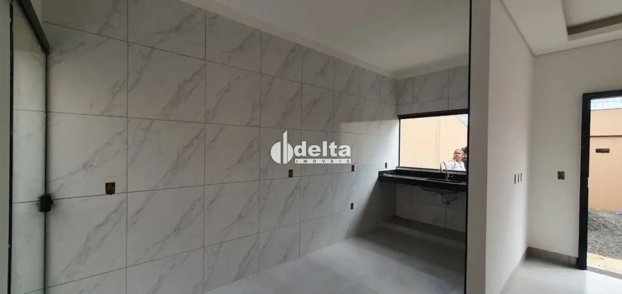 Casa com 3 quarto sendo 1 suíte disponível para Venda no bairro Jardim Brasília em Uberlân - Foto 3
