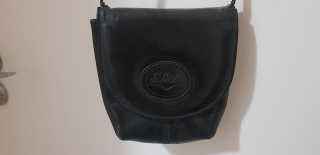 Bolsa 100% couro.