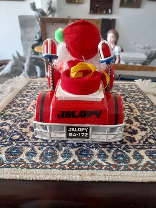 Papai Noel de brinquedo em carro antigo funcionando  - Foto 4
