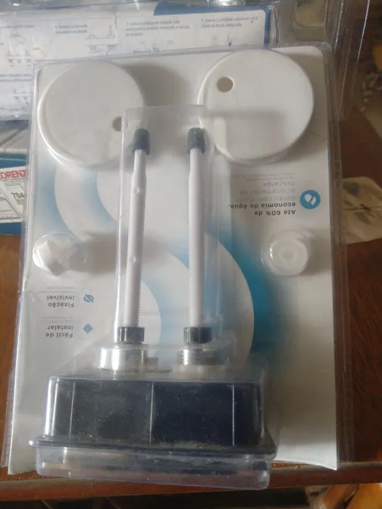 Kit botão de descarga. Na embalagem