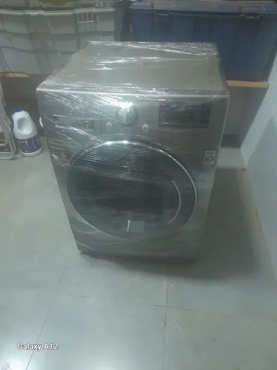 Vendo lava e seca LG inox de 10.5 kg seme nova 