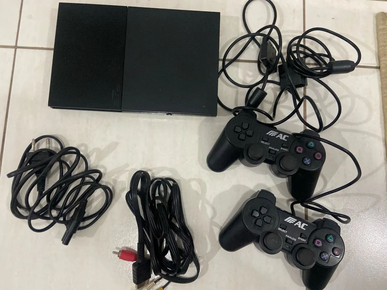 Complete PlayStation 2 with 2 Controllers
