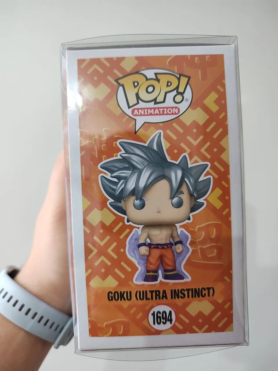 Funko Pop! Goku Ultra Instinct - Hot Topic Exclusive Glow in The Dark + Protetor Incluso  - Foto 4