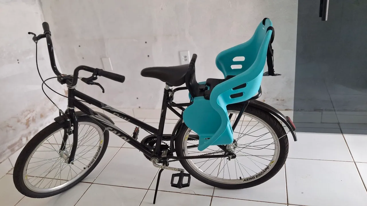 Bicicleta com Cadeirinha / Bem conservada / com nota fiscal.