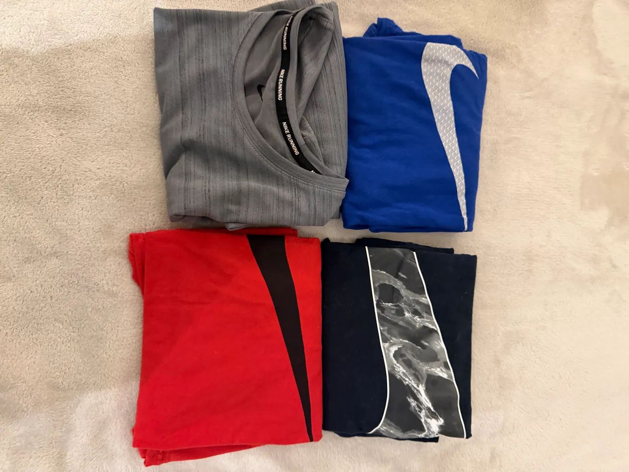 4 camisas Nike por 120,00