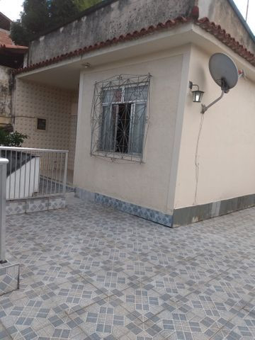 Casa linear ,320 m2 com quintal e vaga