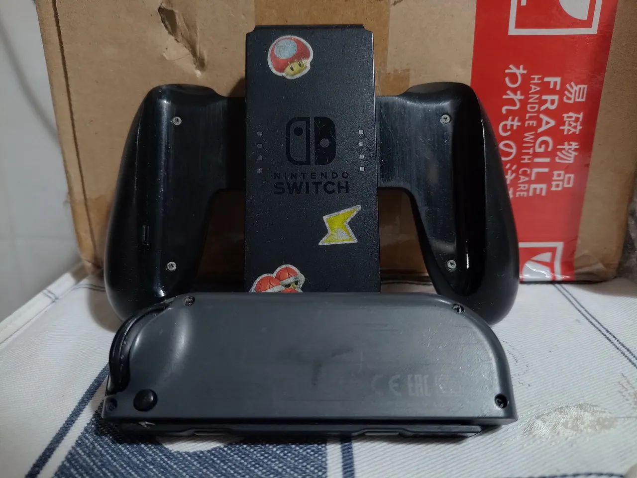 Joy Con Nintendo switch Original + Grip Original  - Foto 2